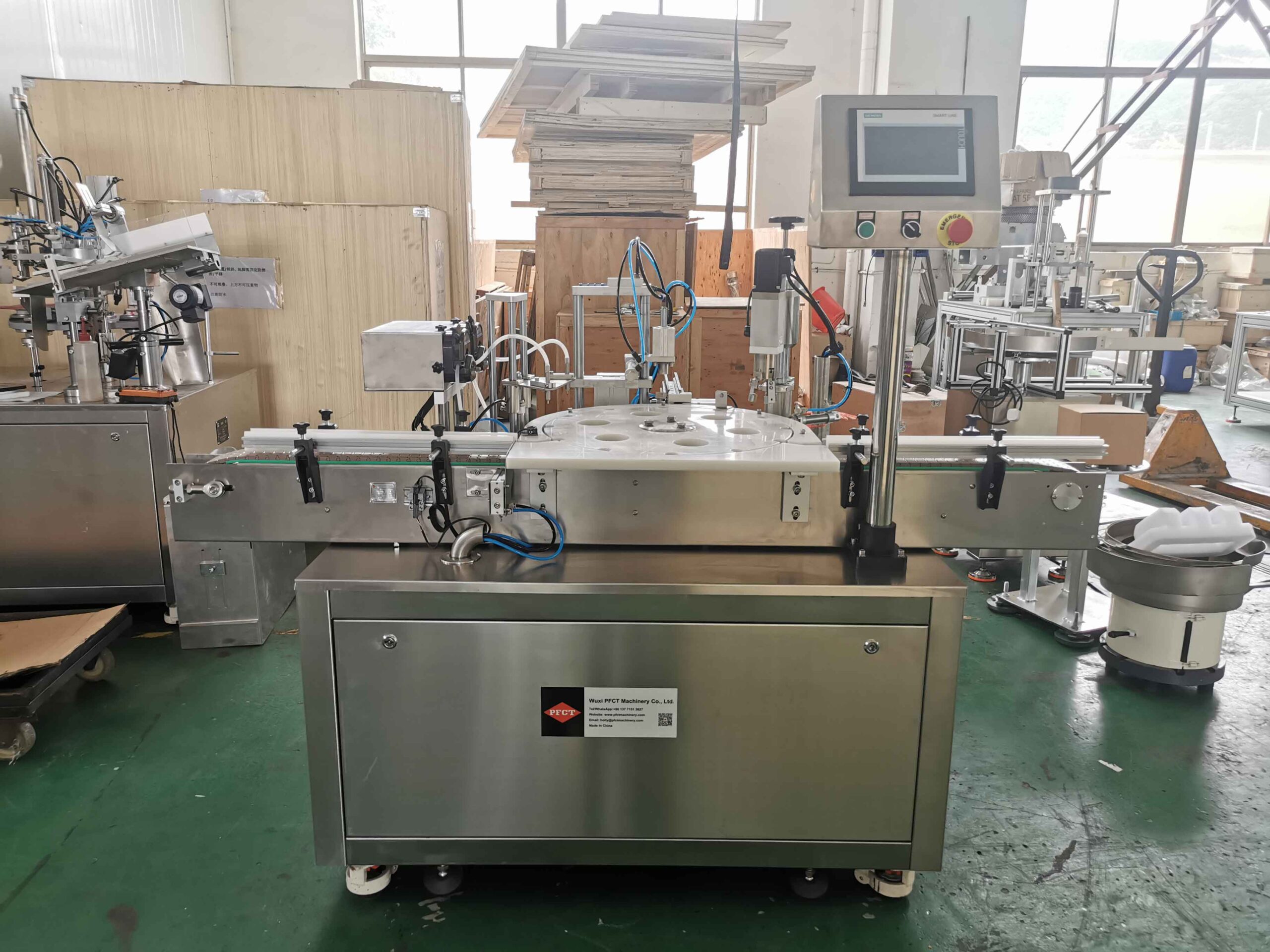 Automatic essential oil filling machine